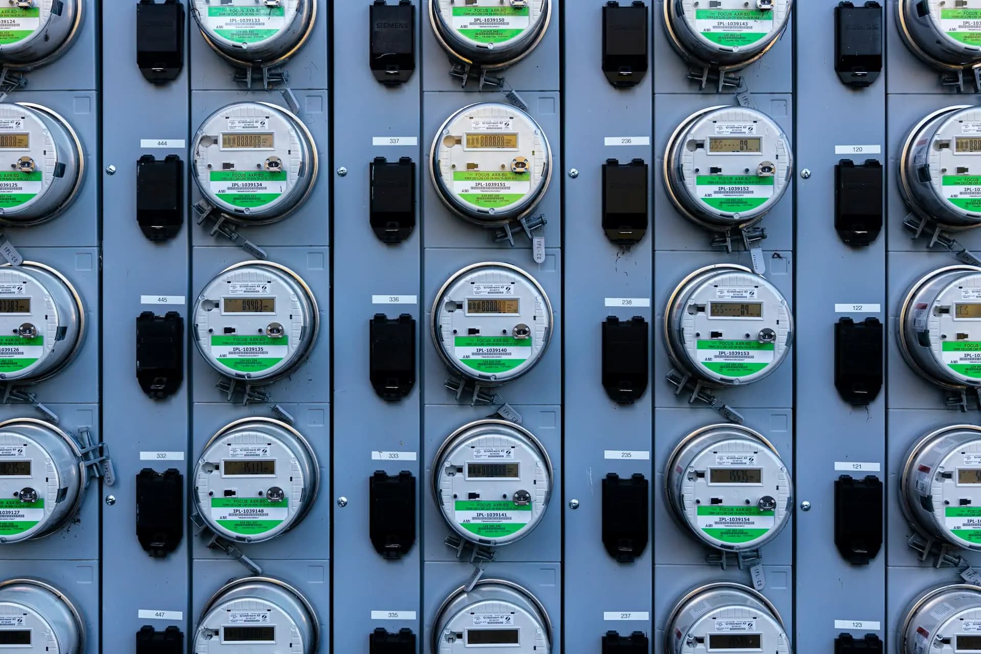 Rows of electricity meters used to measure energy consumption